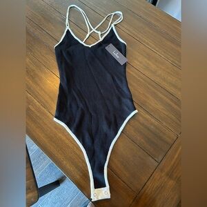 Lulu's Black and White Bodysuit with Sporty Trim
